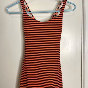 Navy and orange free to be tank. Built in bra. Pads not included.